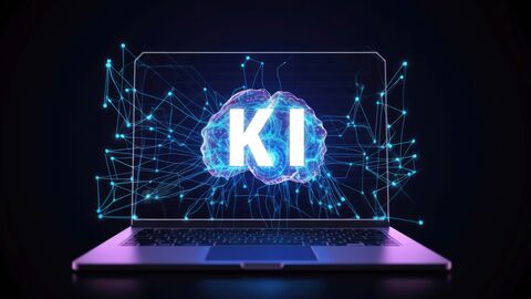 Laptop, auf dessen Bildschirm KI steht Laptop, auf dessen Bildschirm KI steht